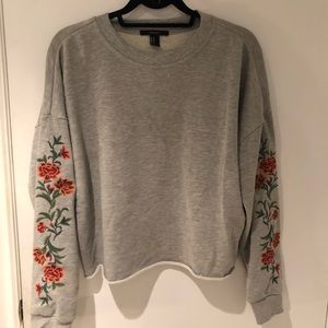 Crop sweatshirt with flower detailing